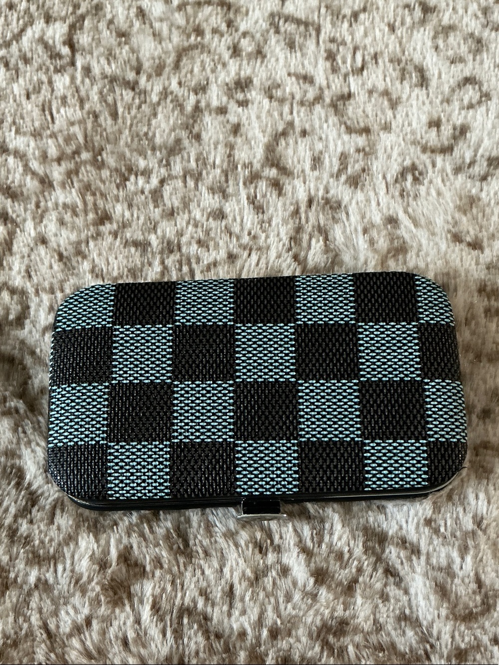 Checker Pattern Case with 8-piece manicure and pedicure grooming kit set. - Picture 3 of 3